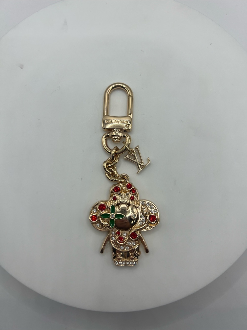 1487.  Gold-Tone Vivi Keychain with Red m,Green and Crystal Accents